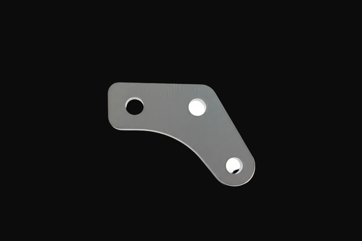 Metal bracket with three holes on a white background